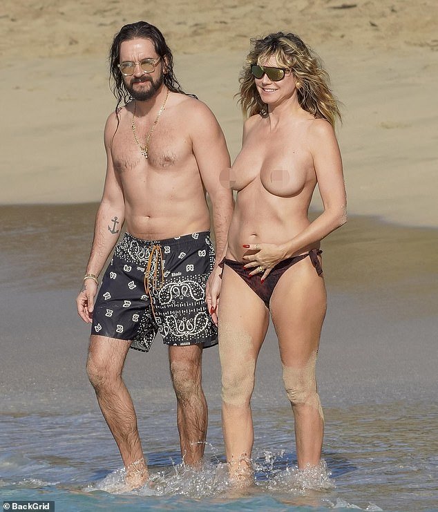 105422833-15454207-Heidi_Klum_went_topless_while_enjoying_a_beach_day_in_St_Barths_-a-92_1768166662135.jpg