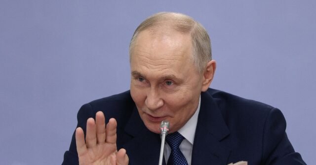 putin-wait-hand-up-getty-640x335.jpg