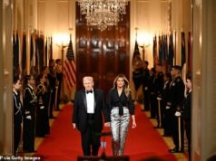 Melania Trump stupisce in pantaloni argentati mentre arriva alla controversa cena del governatore con il marito Donald mentre dozzine di leader boicottano dopo la settimana turbolenta del presidente