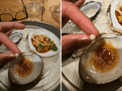 Uomo scioccato dopo aver trovato la perla in Clam al ristorante