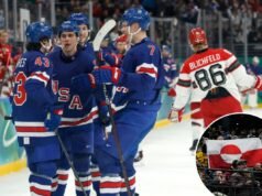 I tifosi olimpici di hockey alzano la bandiera della Groenlandia durante la vittoria dominante degli Stati Uniti sulla Danimarca, scatenando una reazione virale