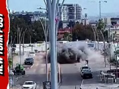 La scioccante CCTV mostra un missile iraniano colpito da una strada israeliana