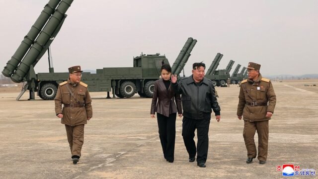 kim-jong-un-and-daughter-missile-test.jpg