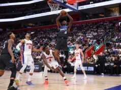 Il poster imperdibile di Jamal Cain schiaccia Jalen Duren nei panni dei Magic Stun Pistons