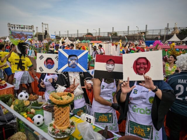 AFP__20260509__B2CJ6F7__v1__HighRes__IndonesiaCultureFoodFblWc2026FansOffbeat-1778512803.jpg