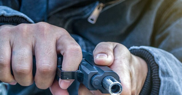 Man-with-gun-640x335.jpg