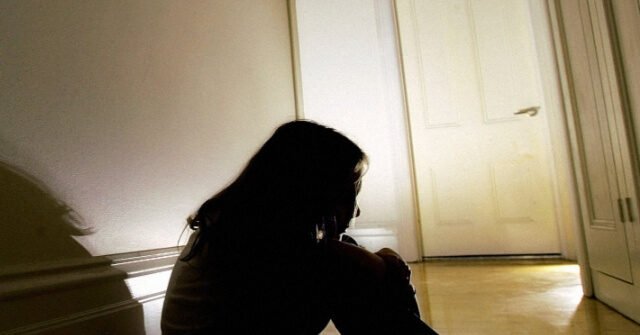 abused-child-in-hallway-640x335.jpeg