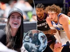 Caitlin Clark incontra un giocatore dei Warriors alla partita dei Giants