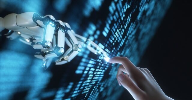 robot-and-human-touching-640x335.jpg