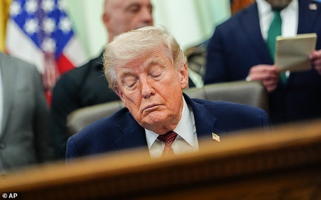 109016389-15864813-President_Trump_closes_his_eyes_in_the_Oval_Office_on_April_18-a-18_1780338792756.jpg