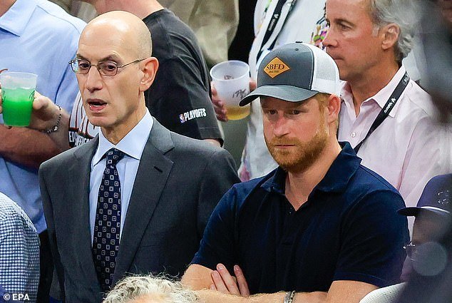 109336507-15898315-Prince_Harry_sat_next_to_NBA_Commissioner_Adam_Silver_during_Gam-a-11_1781409811457.jpg
