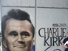I serbi onorano il leader conservatore assassinato con murales di street art di Belgrado