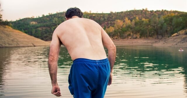 Man-on-shore-of-lake-640x335.jpg