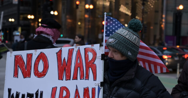 No-War-Demonstrator-with-Flag-640x335.jpeg