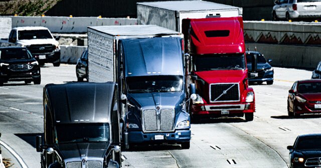 pexels-ninobur-semi-trucks-traffic-highway-stockphoto-640x335.jpg