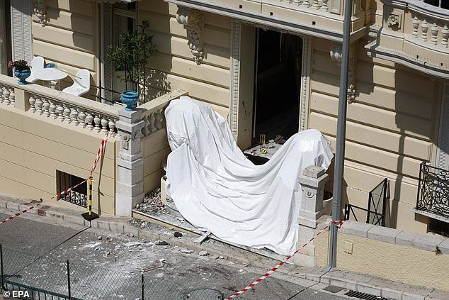 109697793-15949355-The_entrance_of_a_residential_building_in_Monaco_where_an_explos-a-45_1783026562801.jpg