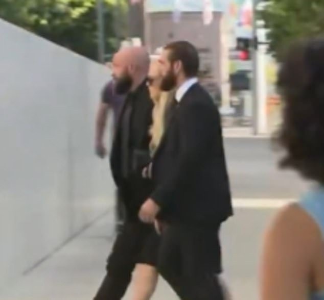 109835875-15957309-Erika_Kirk_is_seen_walking_into_the_Utah_court_house_Monday_morn-m-111_1783367061377.jpg