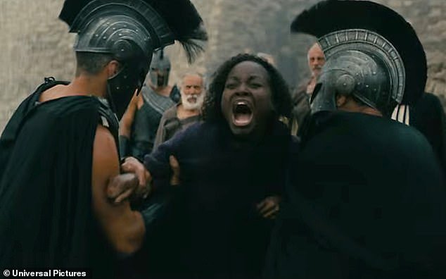 109840685-15963901-Lupita_Nyong_o_pictured_plays_Helen_of_Troy_and_her_sister_Clyte-m-3_1783578340803.jpg