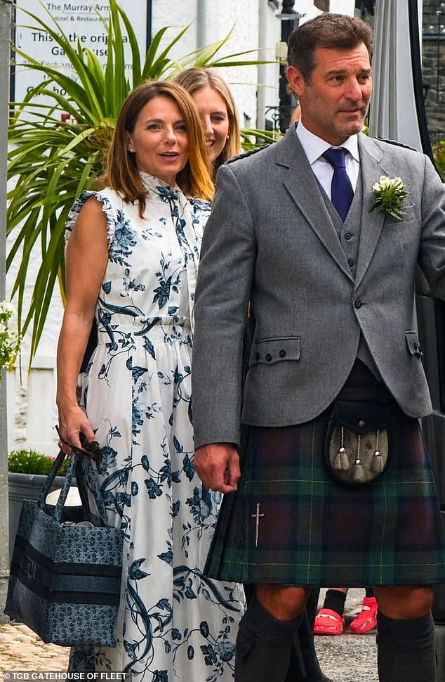109958551-15970709-Geri_Horner_and_former_F1_driver_Mark_Webber_were_spotted_ahead_-a-143_1783798343276.jpg