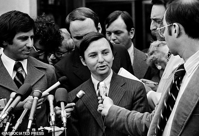 109992157-15974679-Donald_Segretti_is_surrounded_by_newsmen_outside_the_U_S_Distric-a-11_1784230907222.jpg