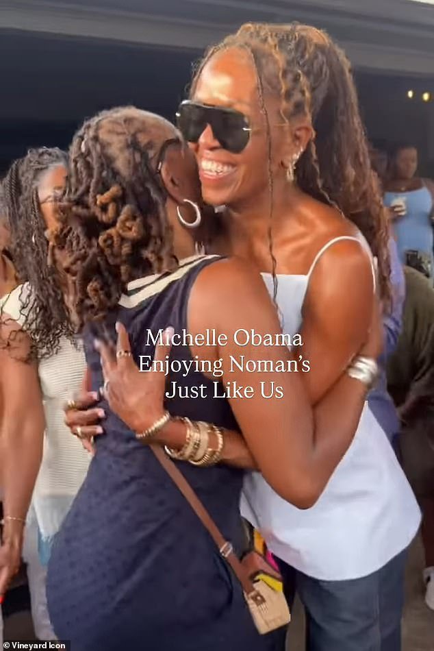 110066219-15983013-Michelle_Obama_was_seen_partying_it_up_without_husband_Barack_Ob-a-68_1784220448346.jpg