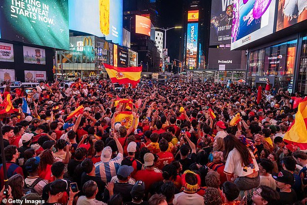 110126739-15989693-Times_Square_was_full_of_Spain_World_Cup_fans_into_the_early_hou-a-29_1784528419712.jpg