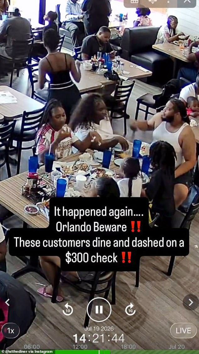 110141817-15990589-A_family_of_seven_were_caught_on_surveillance_footage_ordering_a-a-7_1784569323468.jpg