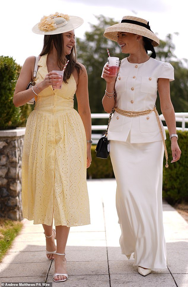 110295455-16010595-Ready_for_the_racing_action_Racegoers_arrive_for_day_one_of_the_-m-57_1785243129942.jpg