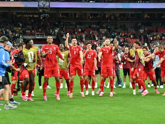 2026-07-03T051447Z_268137939_UP1EM730EKLB5_RTRMADP_3_SOCCER-WORLDCUP-SWI-DZA-1783056314.jpg