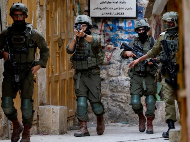2026-07-25T145945Z_1836731780_RC21LMAKKUX6_RTRMADP_3_ISRAEL-PALESTINIANS-HEBRON-SETTLERS-1785069560.jpg