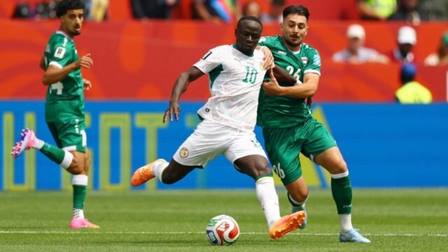 6a3f2d5e9dc0a-pemain-irak-yang-juga-persib-bandung-frans-putros-duel-dengan-kapten-senegal-sadio-mane-di-piala-dunia-2026_gemini_1265_711.jpg