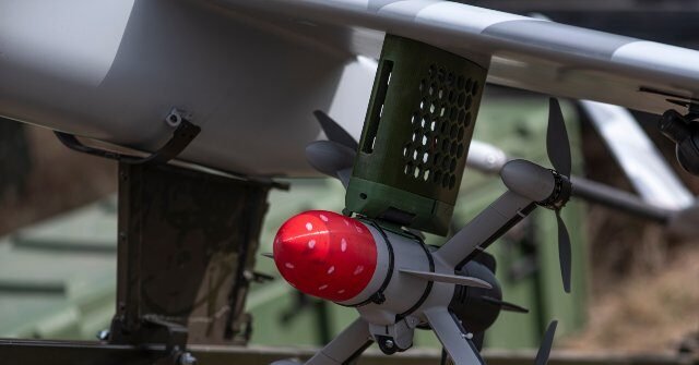Drone-armed-with-missile-640x335.jpg