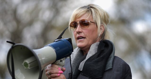 Erin-Brockovich-on-megaphone-640x335.jpg