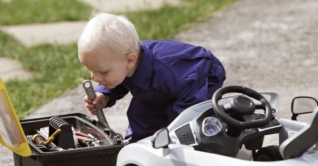 Little-boy-fixing-toy-car-with-adult-tools-640x335.jpg