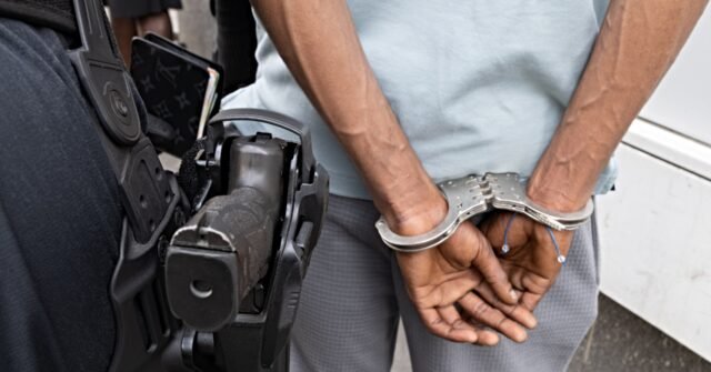 in-handcuffs-640x335.jpg