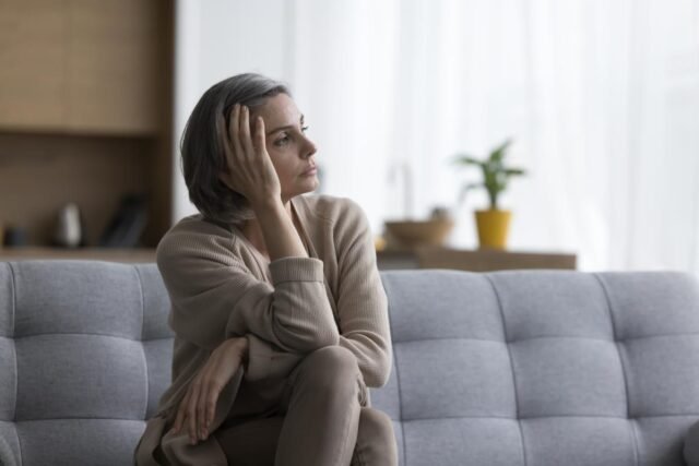 sad-thoughtful-grey-haired-woman-128646157.jpg