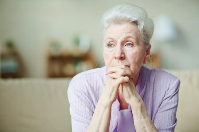 stock-image-sad-elderly-woman-20106422.jpg