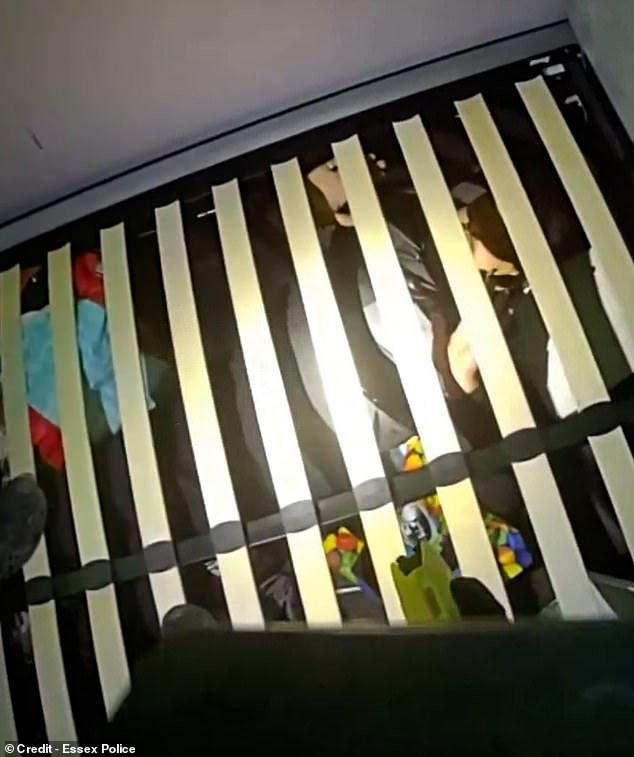 110517003-16038773-This_is_the_moment_armed_police_found_a_stalker_hiding_under_a_b-m-13_17862204789.jpeg