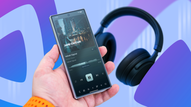 hand-holding-a-smartphone-with-a-self-hosted-music-player-headphones-and-the-jellyfin-logo-in-the-ba.png