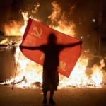Decine di migliaia protestano contro la crisi immobiliare mentre la Spagna annuncia elezioni anticipate